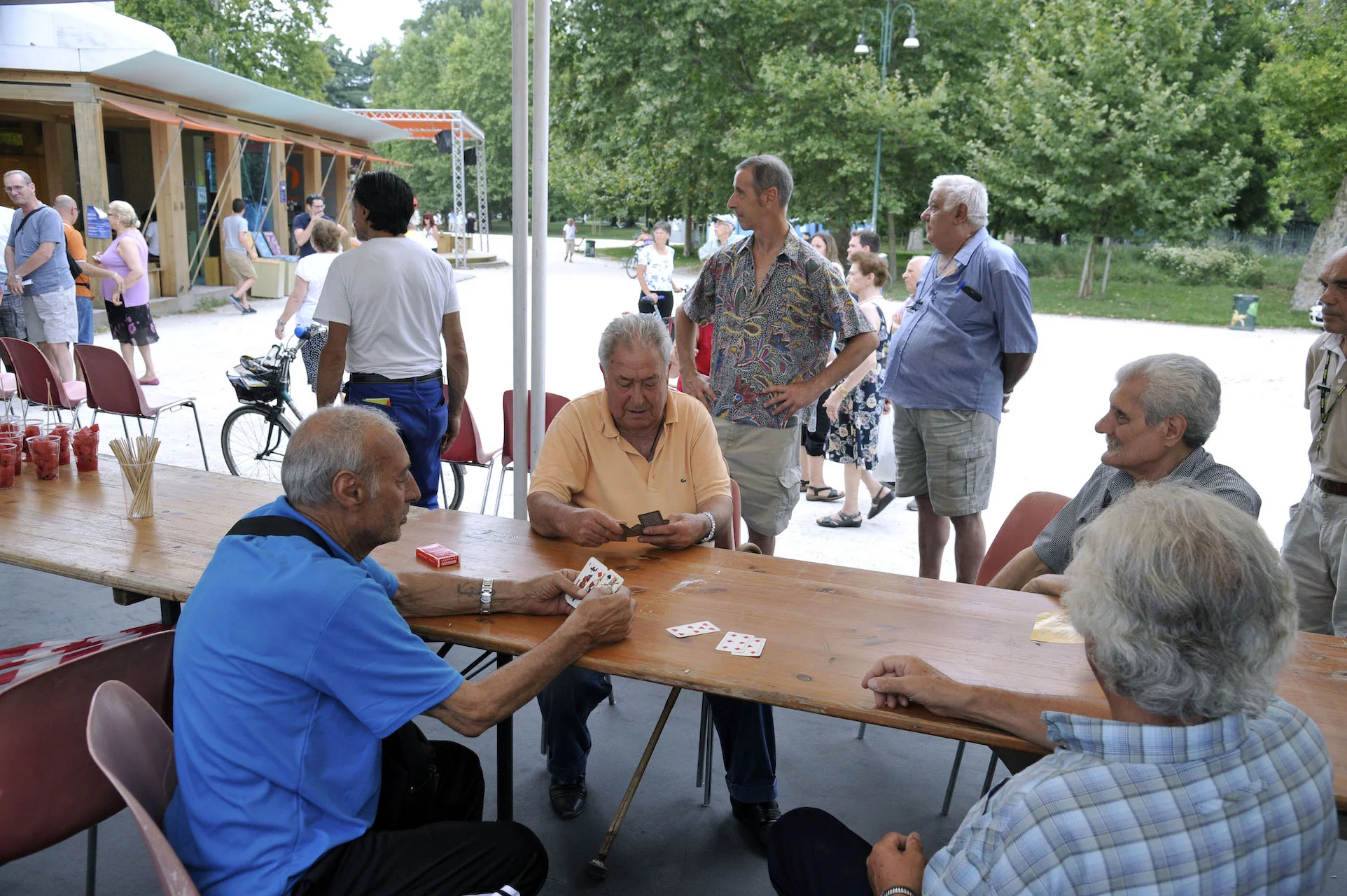 Elderly people at Sempione Park during the summer